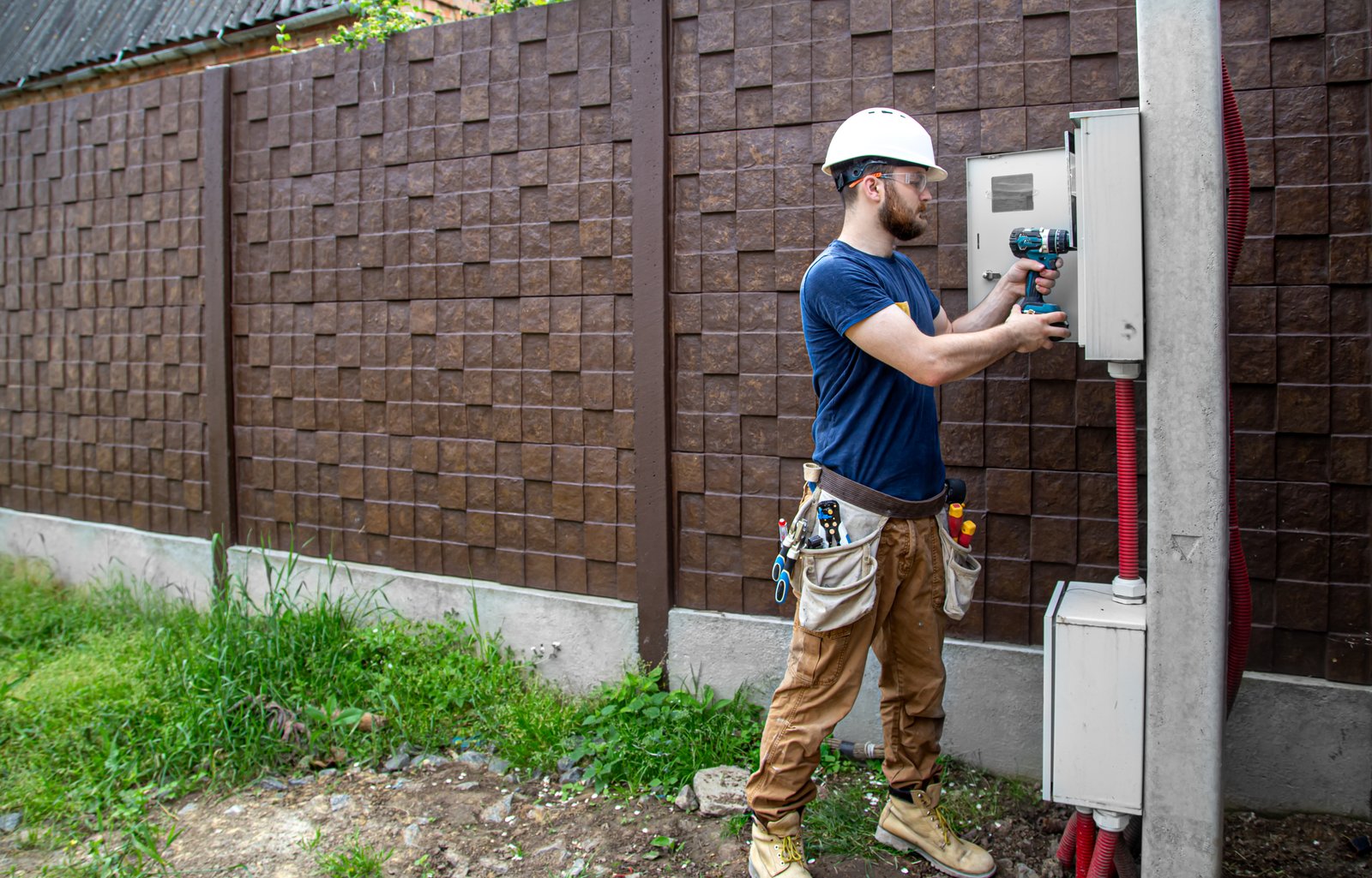Smoky Peak Integrated Systems technician performing low voltage electrical work for a residential property in East Tennessee: